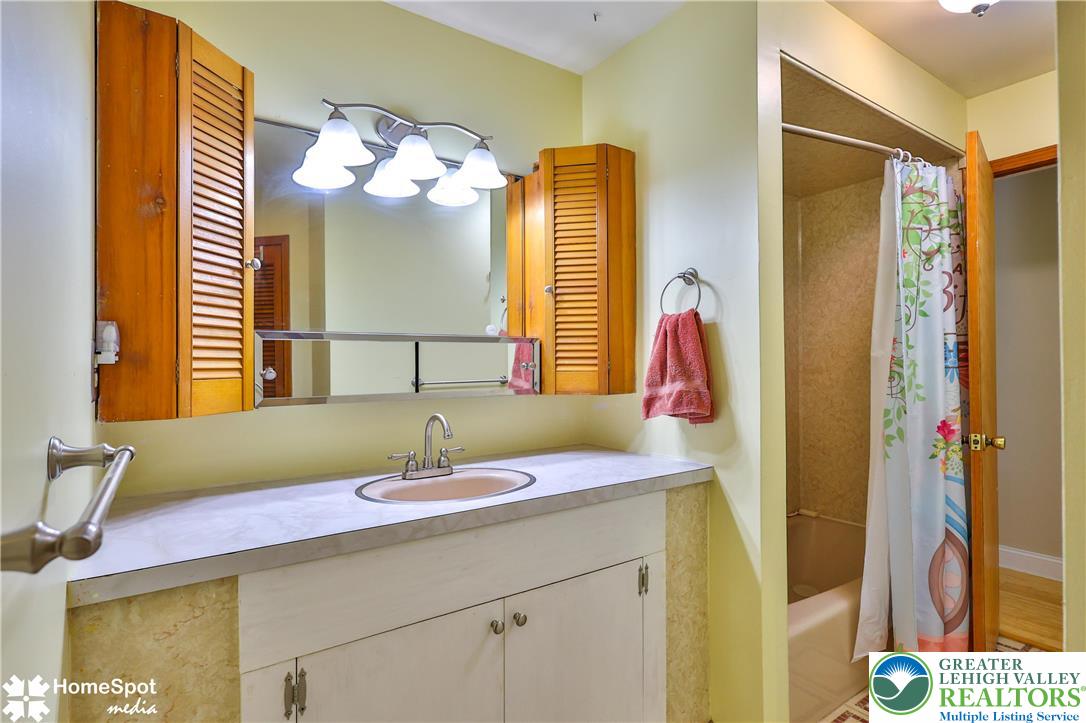 5500 Ayers Road Easton, PA 18040 - Photo 26 of 56 a bathroom with a sink and a mirror