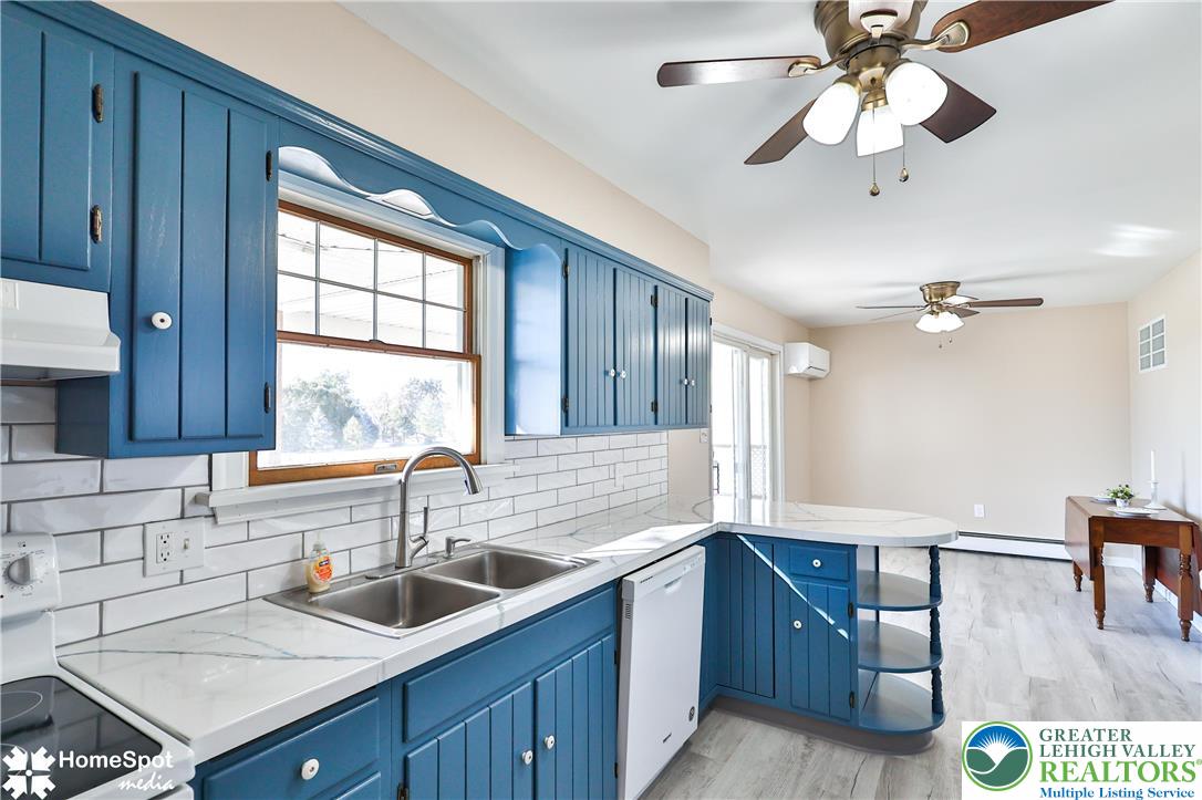 5500 Ayers Road Easton, PA 18040 - Photo 31 of 56 a kitchen with sink a window and cabinets