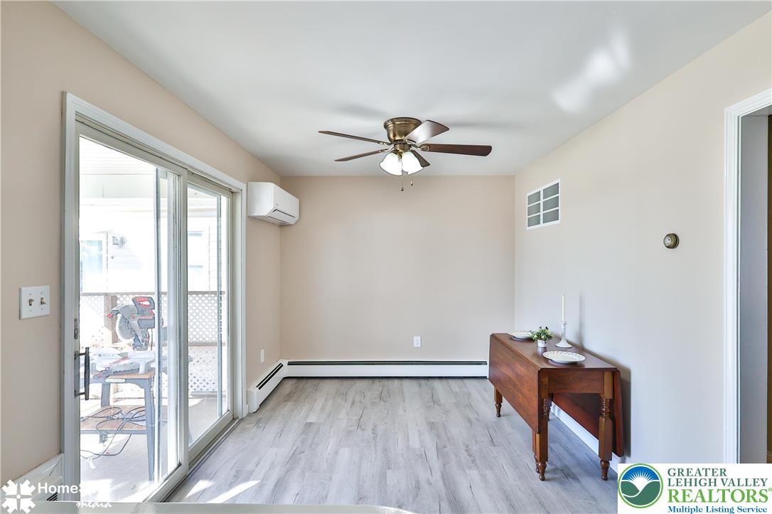 5500 Ayers Road Easton, PA 18040 - Photo 32 of 56 a view of an empty room with a window and wooden floor