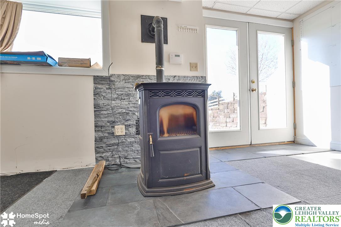 5500 Ayers Road Easton, PA 18040 - Photo 37 of 56 Main - Pellet Stove and Walk Out Entrance
