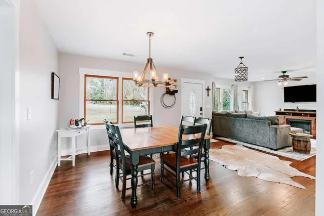 a view of a bathroom with a sink and mirror