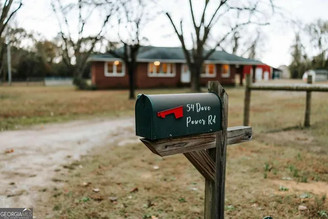a view of a street with brick building in front of it
