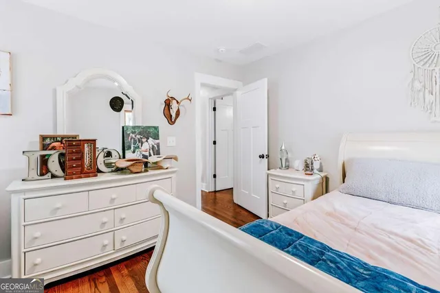 a bathroom with a shower toilet and sink