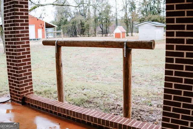 a view of outdoor space with trees all around