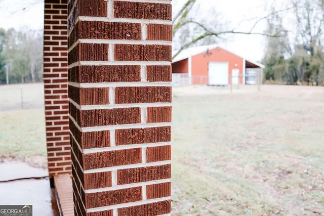 a view of the road and a yard