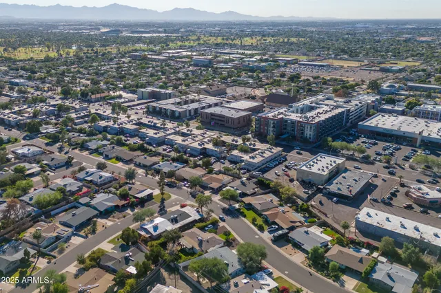 a view of a city with lawn chairs