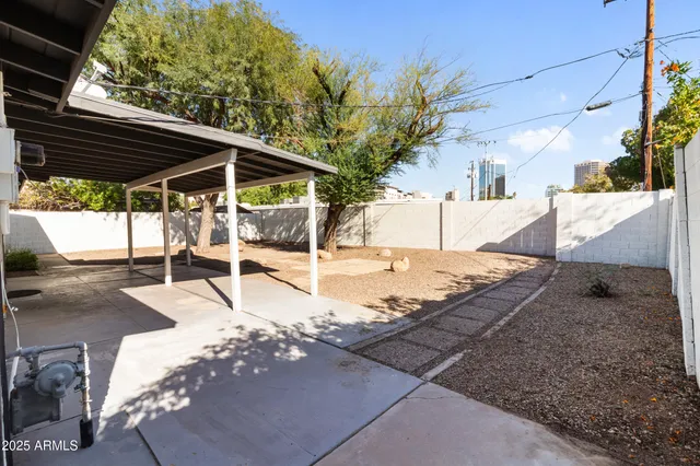 a view of storage and utility room with washer and dryer