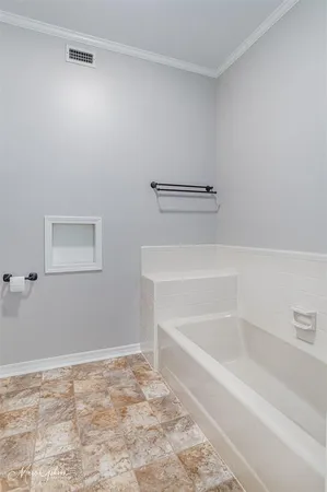 a bathroom with a bathtub