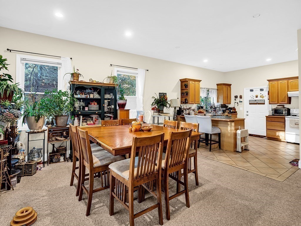 168 Proctor Road Chelmsford, MA 01824 - Photo 16 of 41 a view of a dining room with furniture