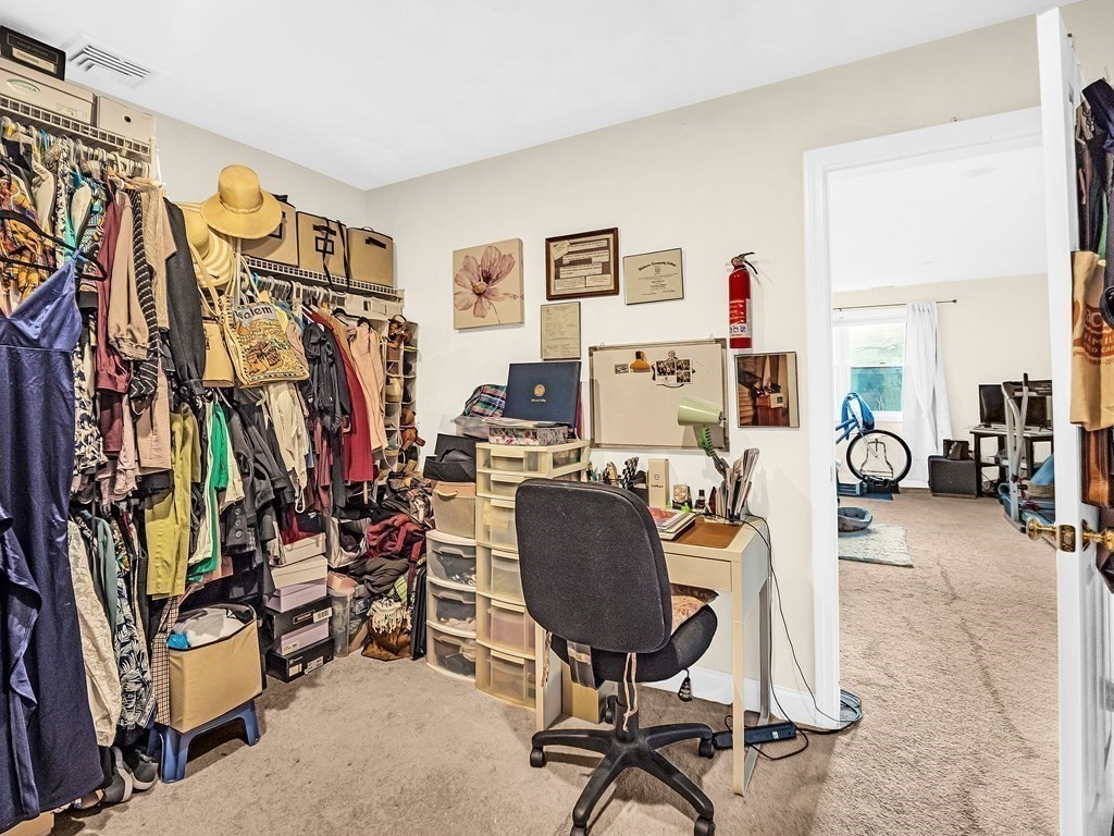 168 Proctor Road Chelmsford, MA 01824 - Photo 25 of 41 a view of a workspace with furniture and a livingroom