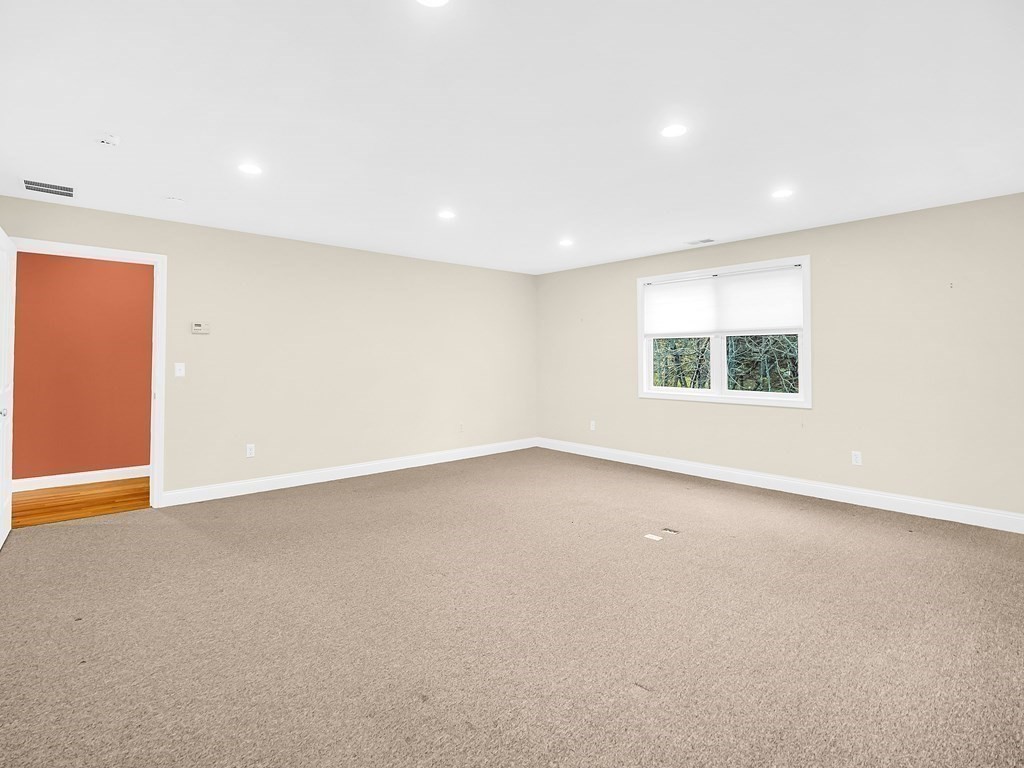 168 Proctor Road Chelmsford, MA 01824 - Photo 30 of 41 an empty room with a window