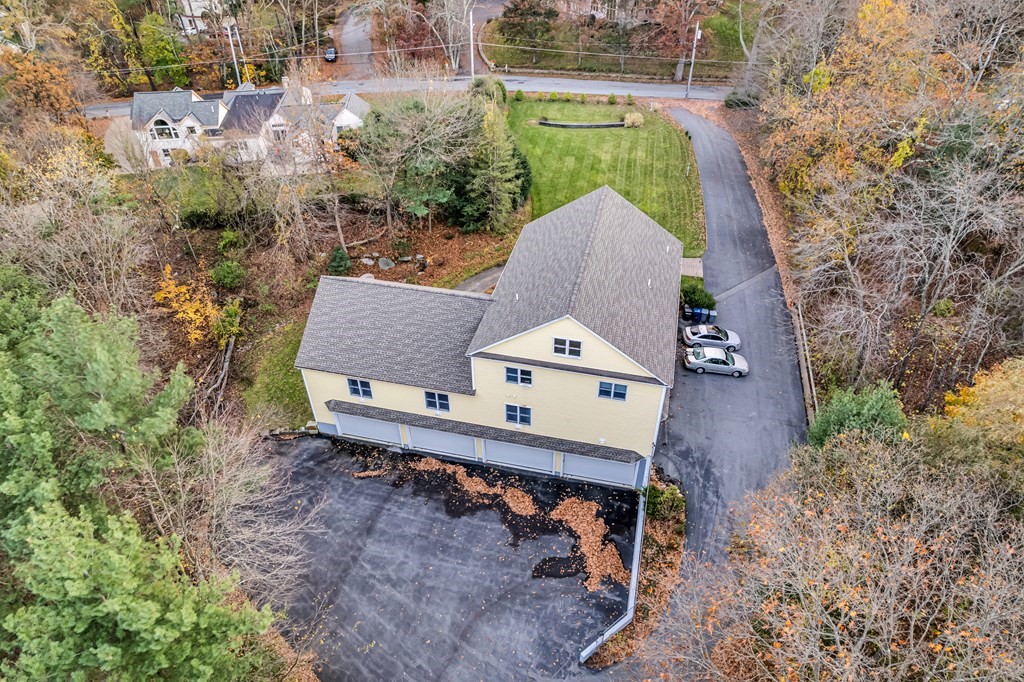 168 Proctor Road Chelmsford, MA 01824 - Photo 33 of 41 an aerial view of a house with a yard and sitting area