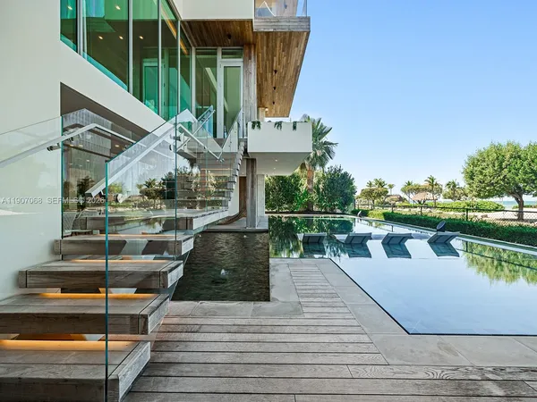 a view of a lake with couches