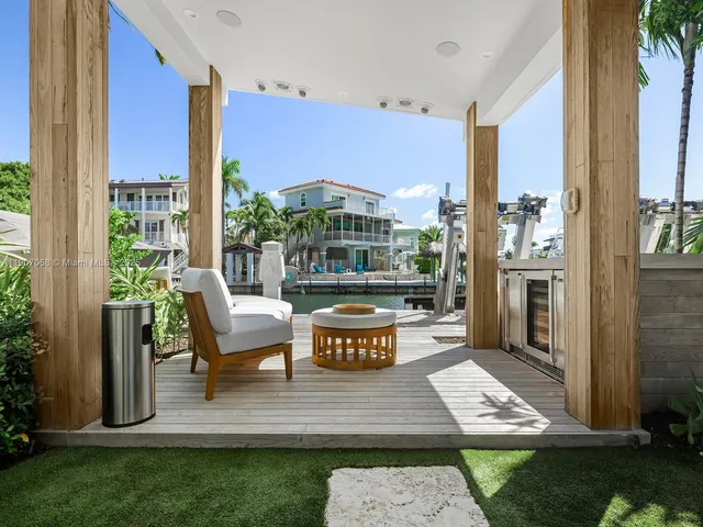 a view of balcony with furniture