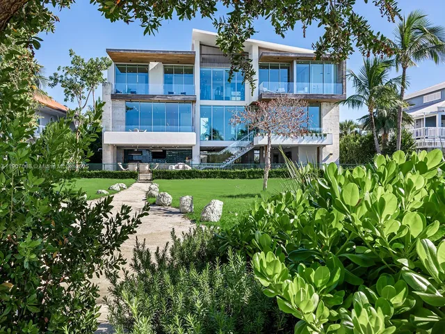 a house with garden in front of it