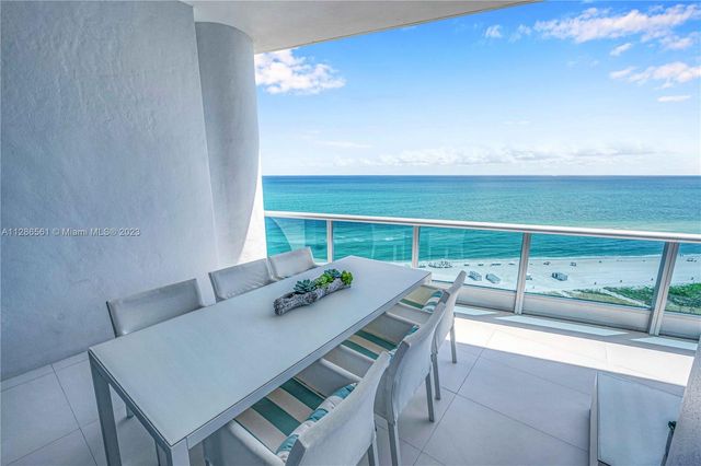 a bathroom with a bathtub and a sink