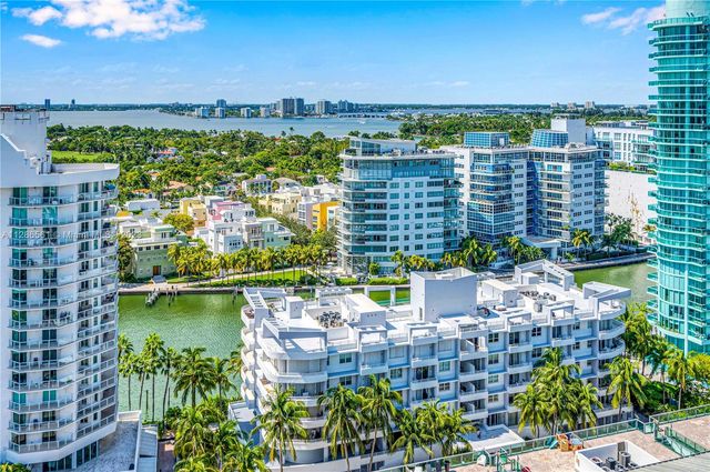 a view of a city with tall buildings