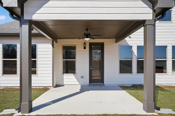 a front view of a house with a porch