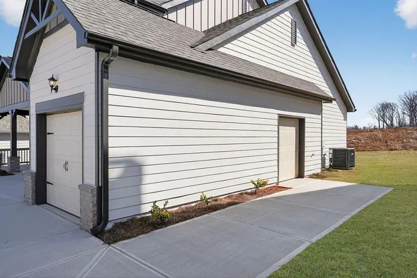 a view of a house with backyard and a window