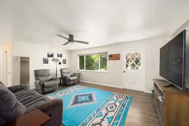 a bedroom with bed and window
