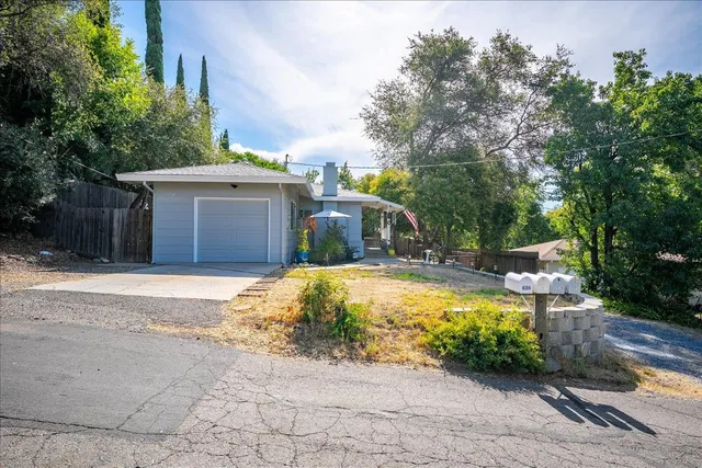 a view of house with outdoor space