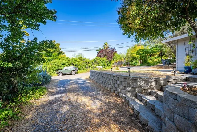 a house view with a garden space