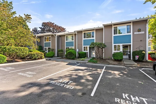 an aerial view of a backyard with table & chairs