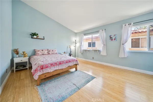 a bedroom with a bed and a cabinets