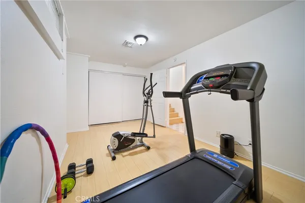 a view of a room with gym equipment