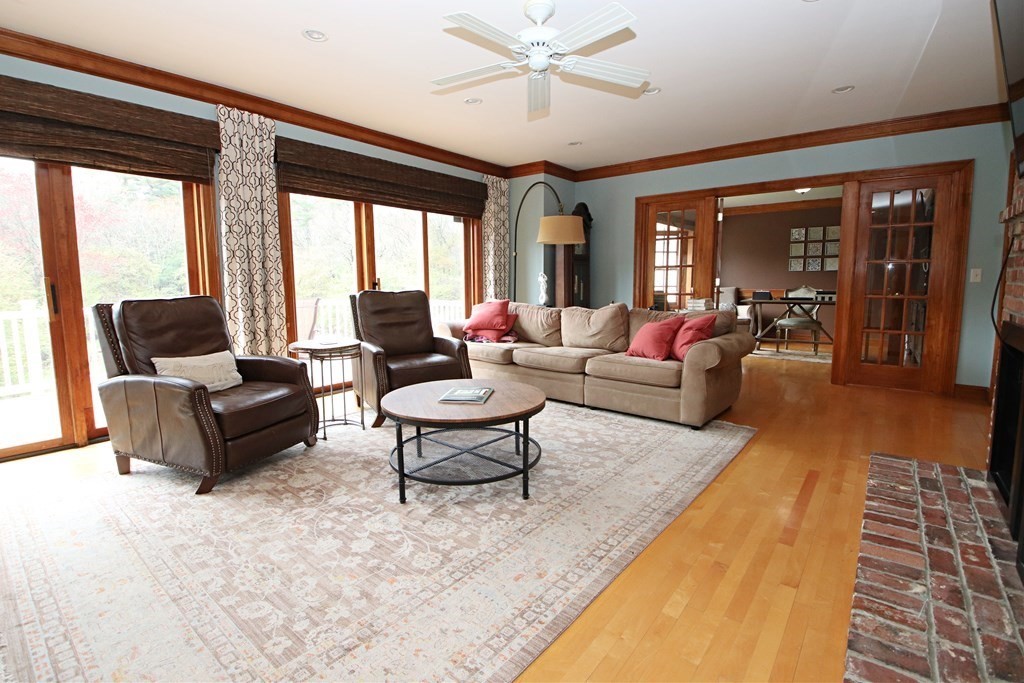 56 Main Street Boxford, MA 01921 - Photo 12 of 42 a living room with furniture and large windows