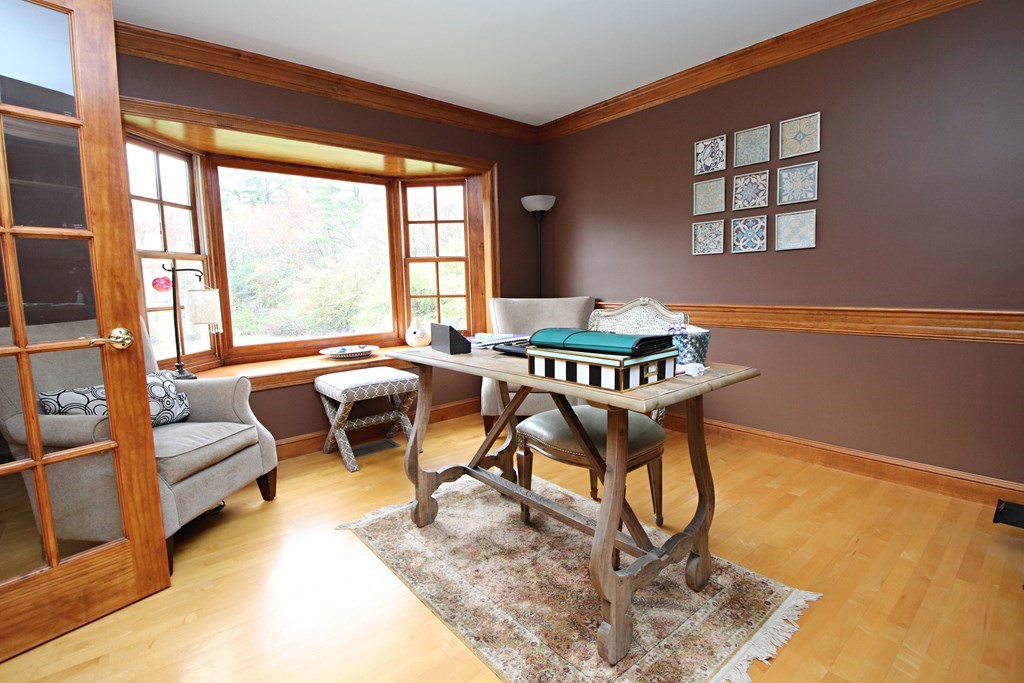 56 Main Street Boxford, MA 01921 - Photo 15 of 42 a work room with furniture and a window