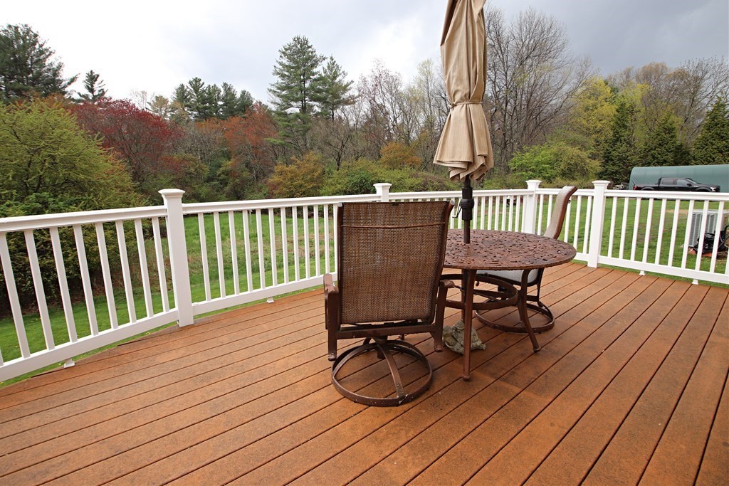 56 Main Street Boxford, MA 01921 - Photo 17 of 42 a view of balcony with wooden floor and fence