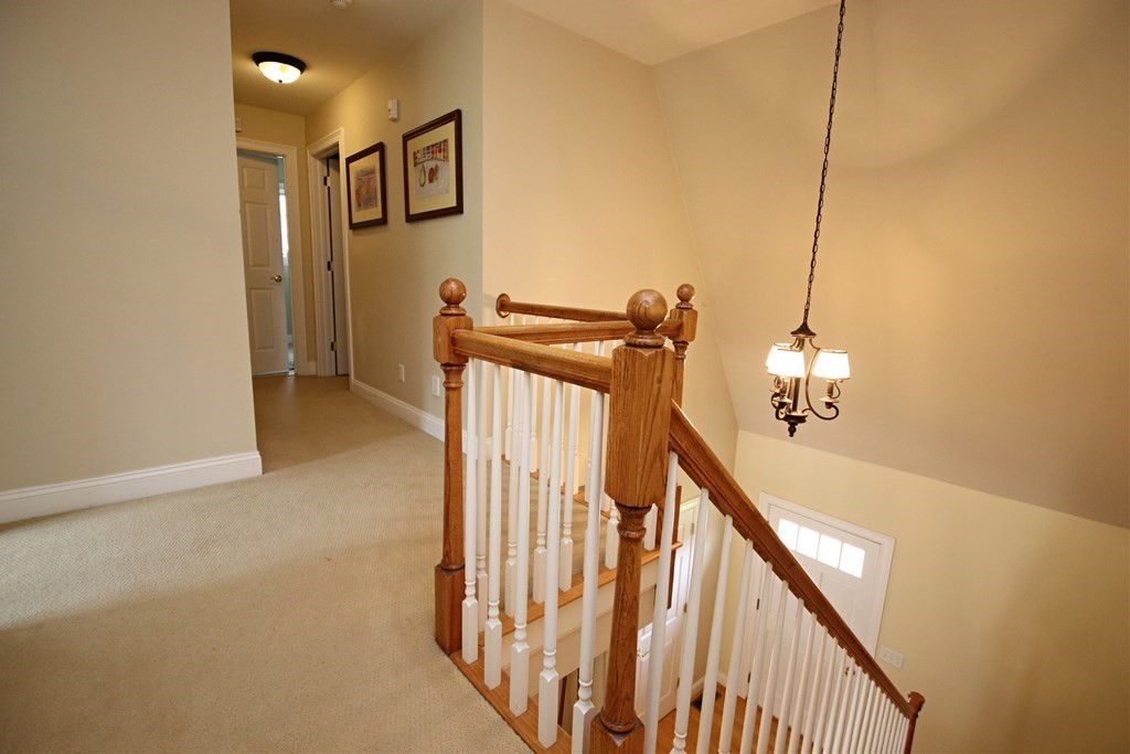 56 Main Street Boxford, MA 01921 - Photo 27 of 42 a view of a hallway with staircase
