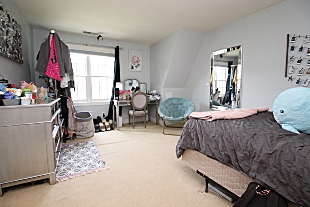 56 Main Street Boxford, MA 01921 - Photo 28 of 42 a bedroom with furniture and a window