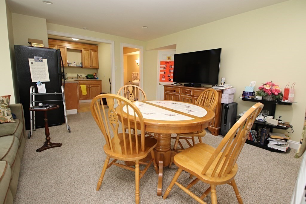 56 Main Street Boxford, MA 01921 - Photo 35 of 42 a dining room with furniture and natural light
