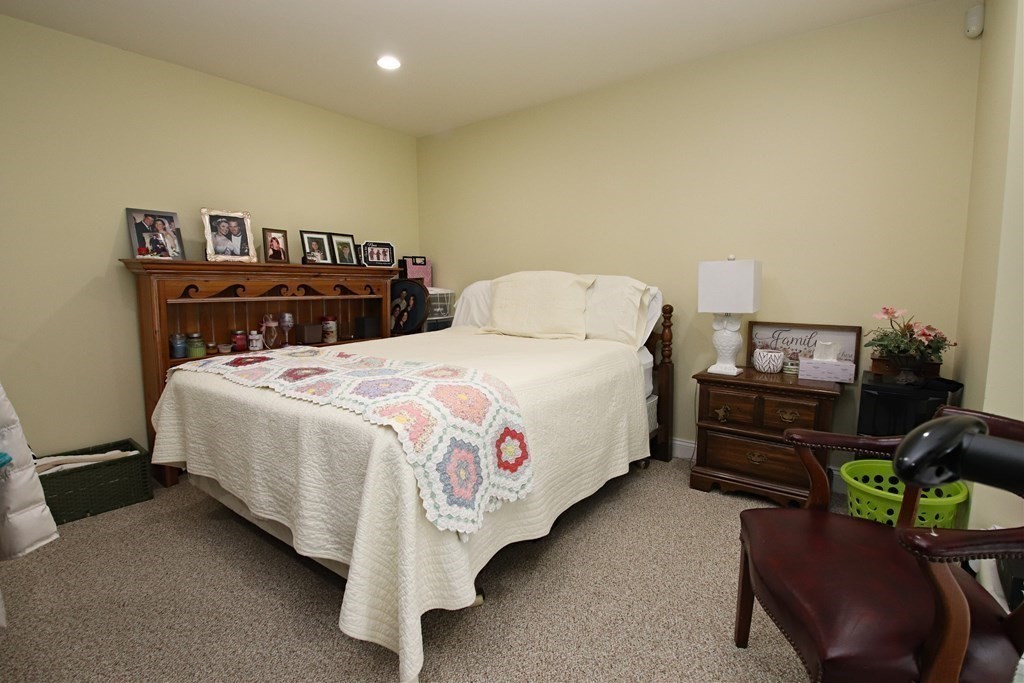 56 Main Street Boxford, MA 01921 - Photo 37 of 42 a bedroom with a bed and a desk