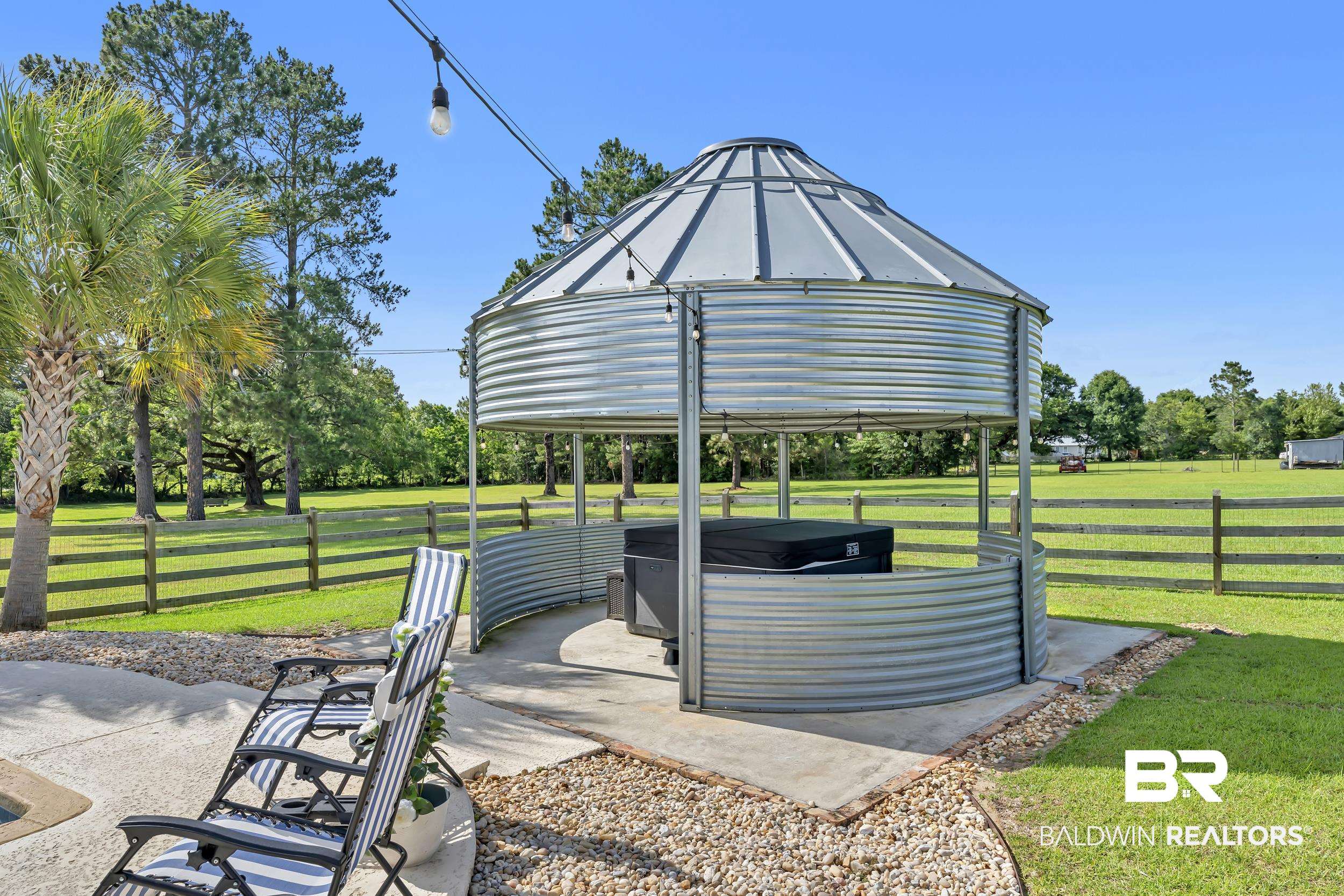 6576 Ranch Loop Road East Grand Bay, AL 36541 - Photo 7 of 39 Galvanized metal gazebo with a concrete foundation and integrated hot tub