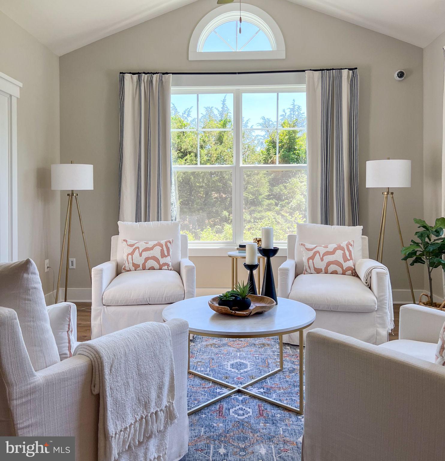 119 Juggins Road Stafford, VA 22556 - Photo 12 of 46 a living room with furniture a lamp and a large window