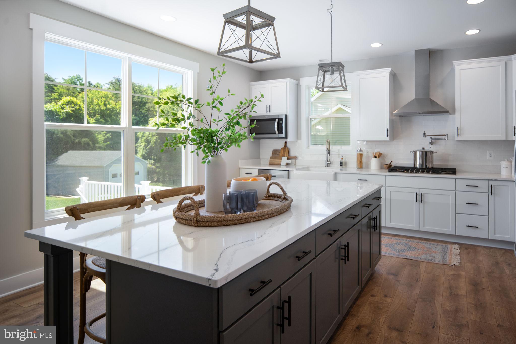 119 Juggins Road Stafford, VA 22556 - Photo 13 of 46 a kitchen with a sink a counter space cabinets and appliances