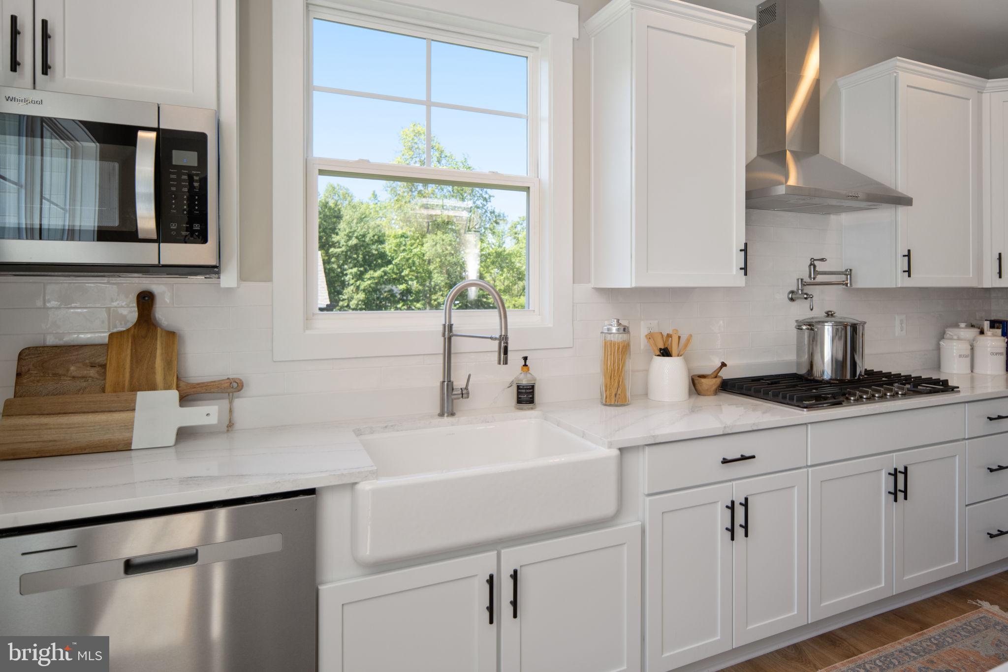 119 Juggins Road Stafford, VA 22556 - Photo 17 of 46 a kitchen with appliances cabinets and a sink