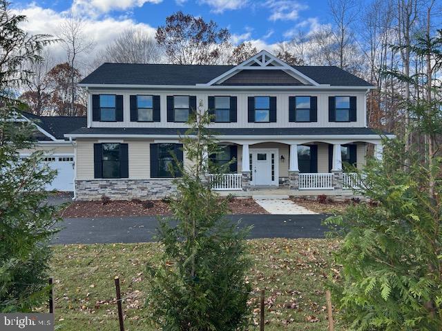 119 Juggins Road Stafford, VA 22556 - Photo 2 of 46 a front view of a house with a yard