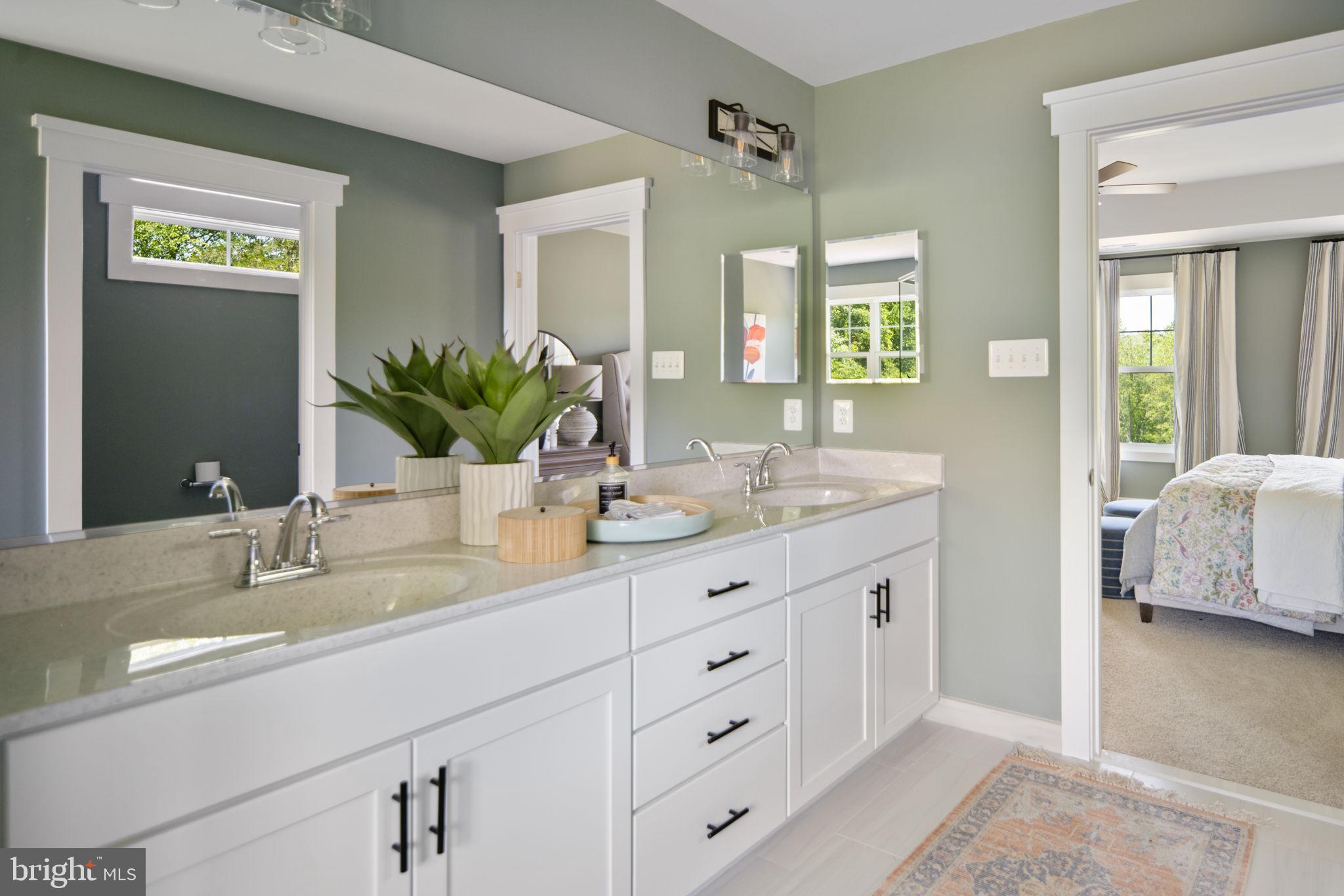 119 Juggins Road Stafford, VA 22556 - Photo 30 of 46 a bathroom with a granite countertop sink and a mirror