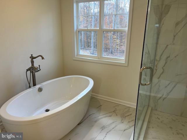 119 Juggins Road Stafford, VA 22556 - Photo 45 of 46 a white bath tub sitting in a bathroom