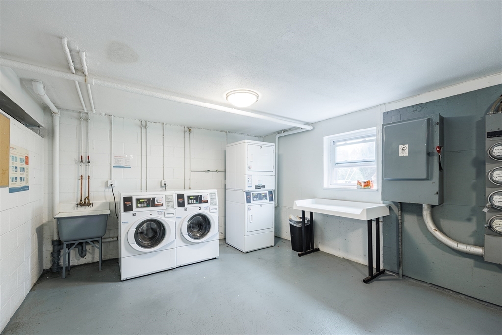 A1 Colonial Drive, Unit 10 Andover, MA 01810 - Photo 8 of 18 a utility room with dryer and washer