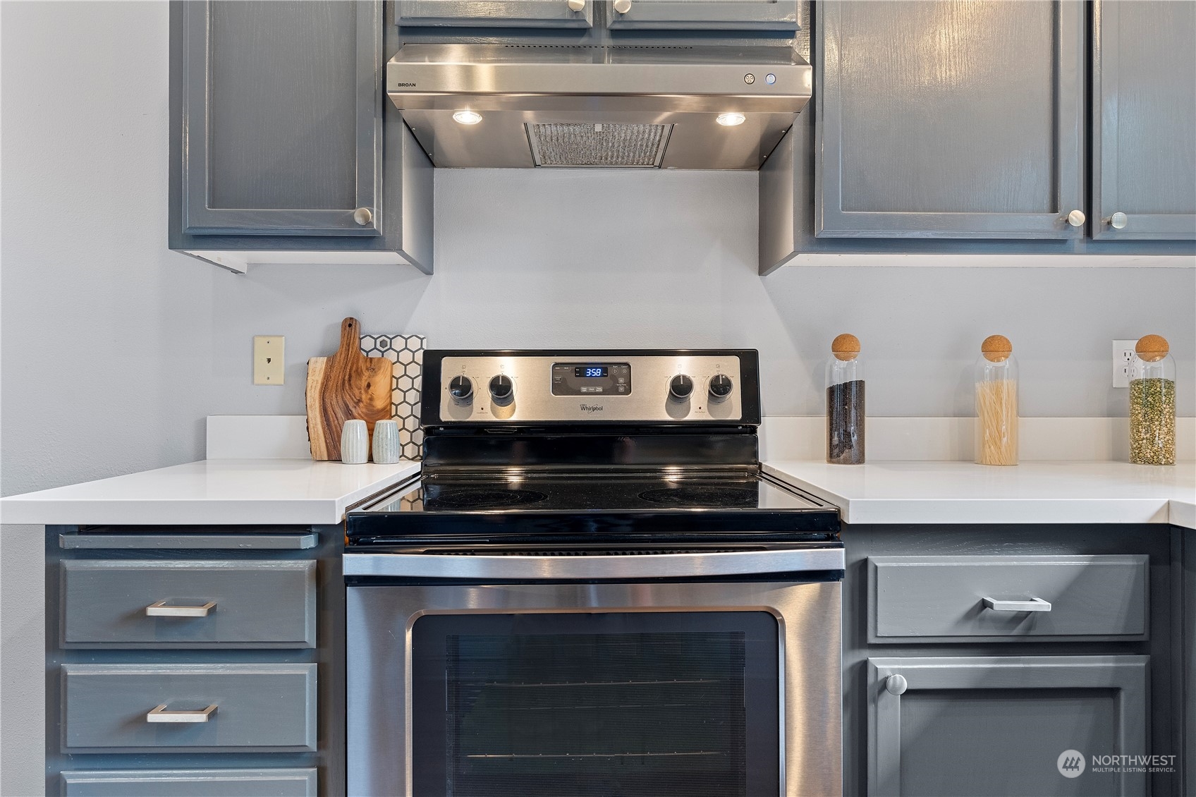 23613 23rd Avenue West Bothell, WA 98021 - Photo 14 of 36 a stove top oven sitting inside of a kitchen