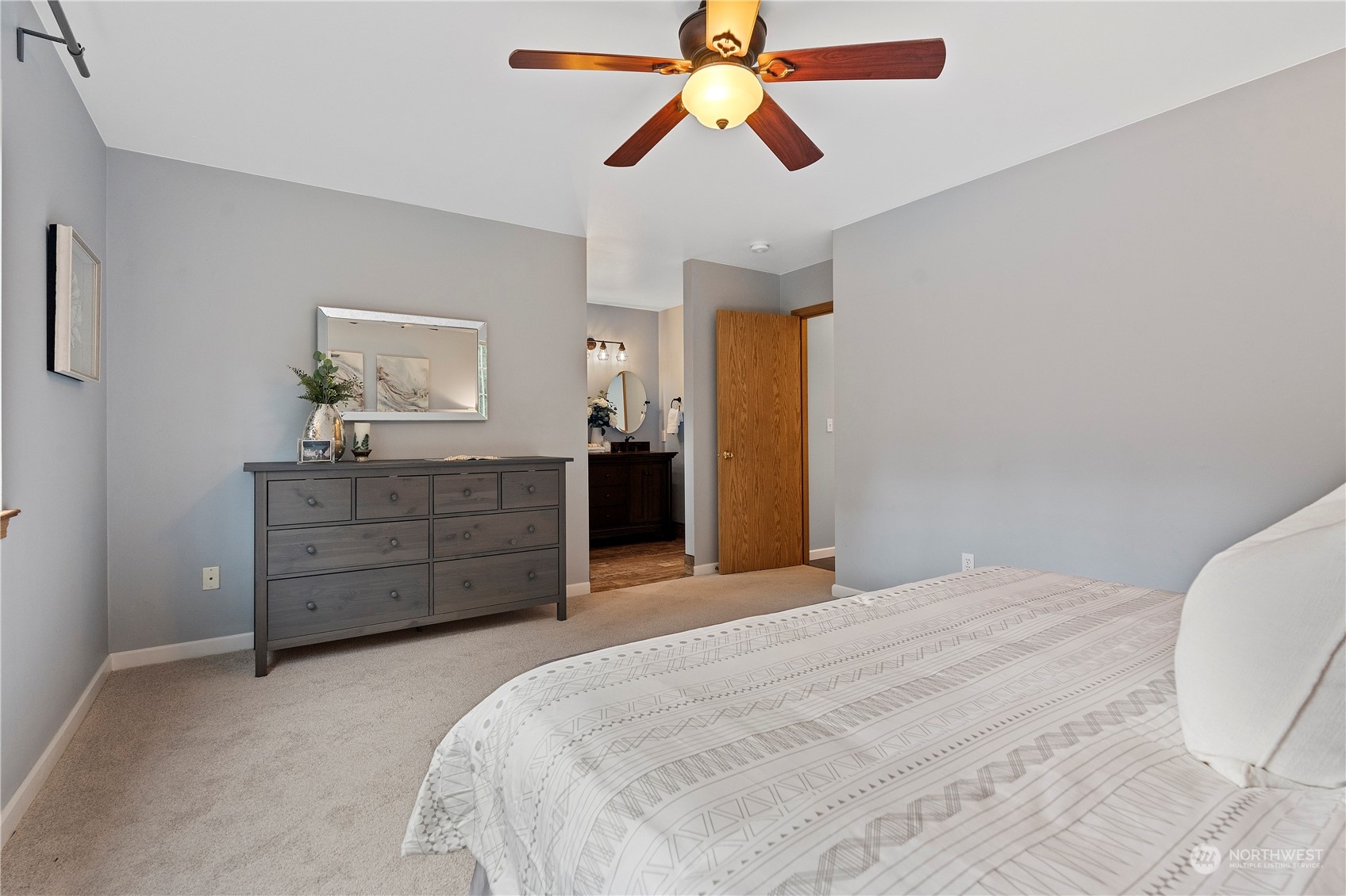 23613 23rd Avenue West Bothell, WA 98021 - Photo 17 of 36 a bedroom with a bed and a dresser