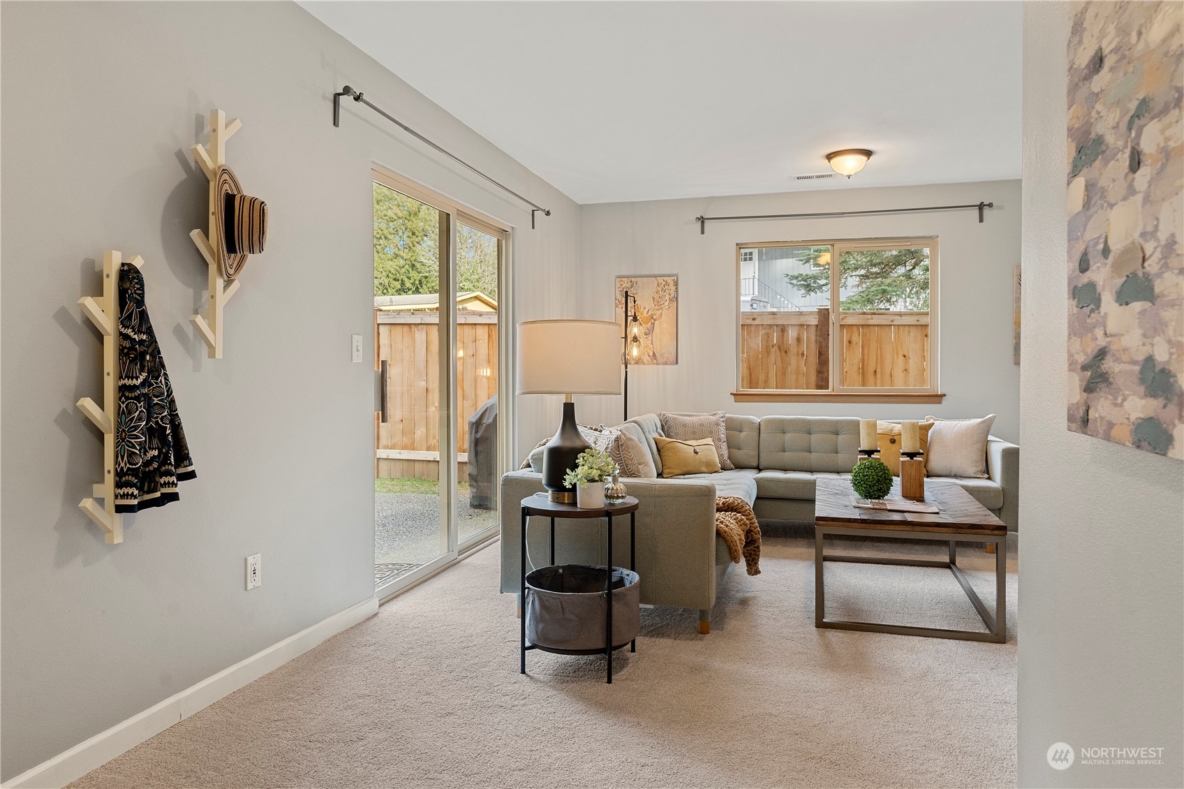 23613 23rd Avenue West Bothell, WA 98021 - Photo 26 of 36 a living room with furniture and floor to ceiling windows