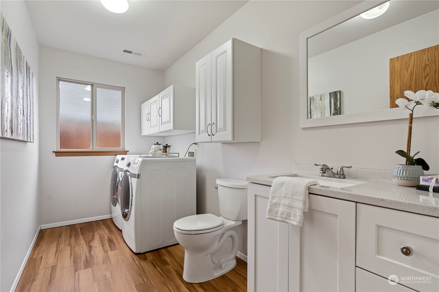 23613 23rd Avenue West Bothell, WA 98021 - Photo 28 of 36 a bathroom with a sink toilet and mirror