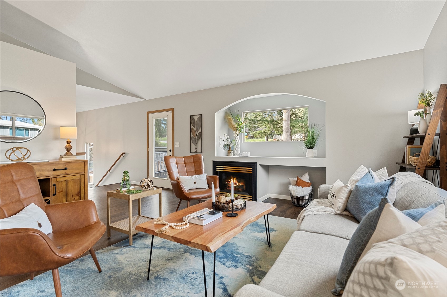 23613 23rd Avenue West Bothell, WA 98021 - Photo 5 of 36 a living room with furniture a fireplace and a large window
