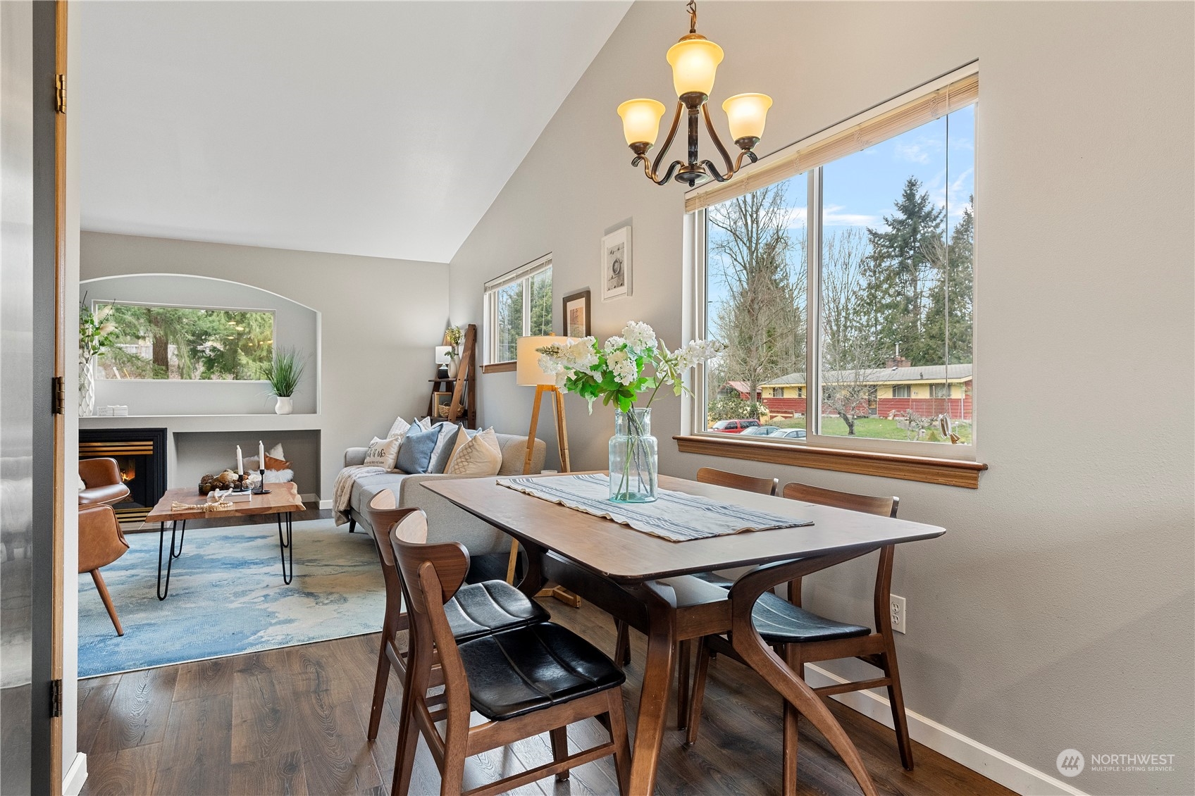 23613 23rd Avenue West Bothell, WA 98021 - Photo 10 of 36 a view of a dining room with furniture window and wooden floor